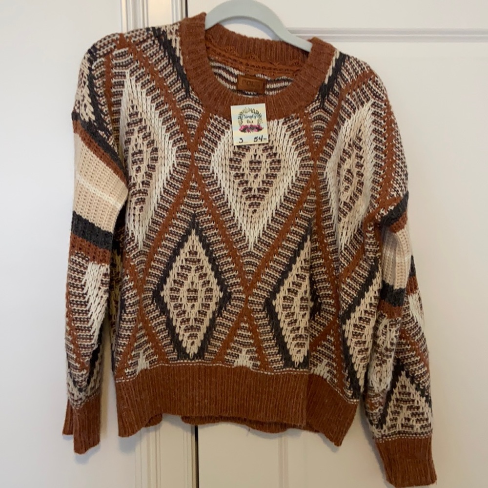 women’s boutique sweater size small. new with tags